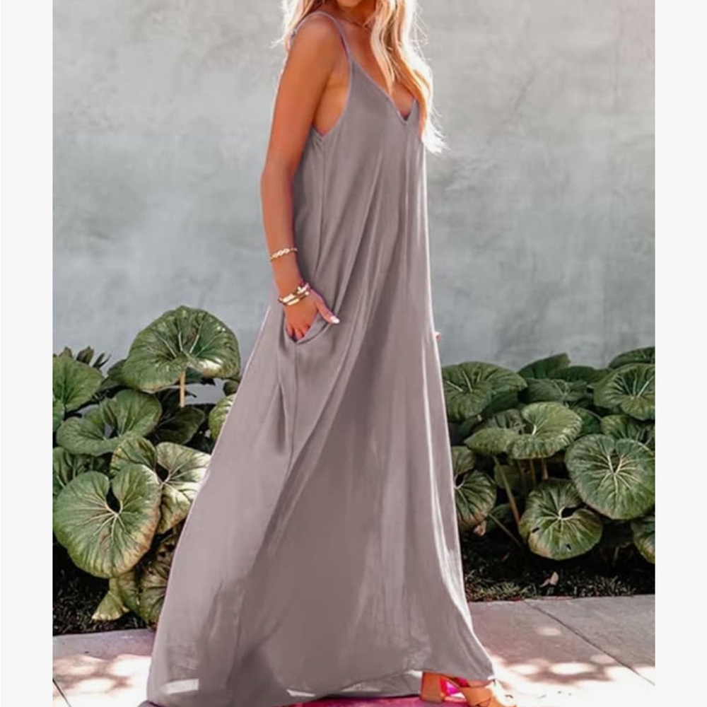 COPY - Soft beautiful dress. I bought on Amazon and did not need . Never worn.